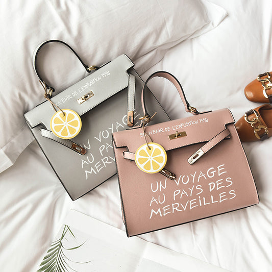 حقيبة نسائية جديدة برية حقيبة PU بسيطة حقيبة يد كيلي حرف حقيبة كتف رسول عادية بالجملة