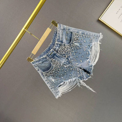 Short en jean à jambe large avec trous tendance pour femme