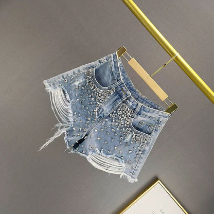 Short en jean à jambe large avec trous tendance pour femme