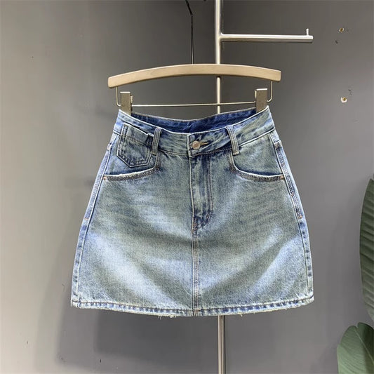 Jupe en jean délavée à la mode pour femme Jupe simple, gracieuse et polyvalente pour les hanches Jupe trapèze de niche