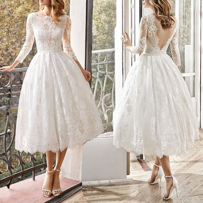 Robe de mariée mi-longue à manches longues et coupe ajustée